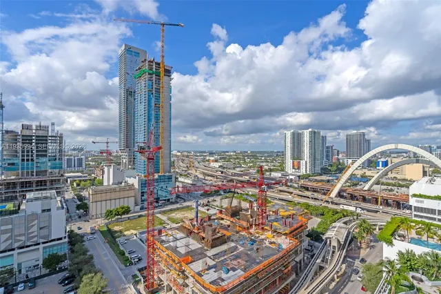 a view of a city with tall buildings