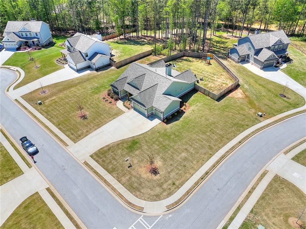 16 Boxwood Court Monroe, GA 30655 - Photo 5 of 41 a view of a swimming pool with a lounge chairs