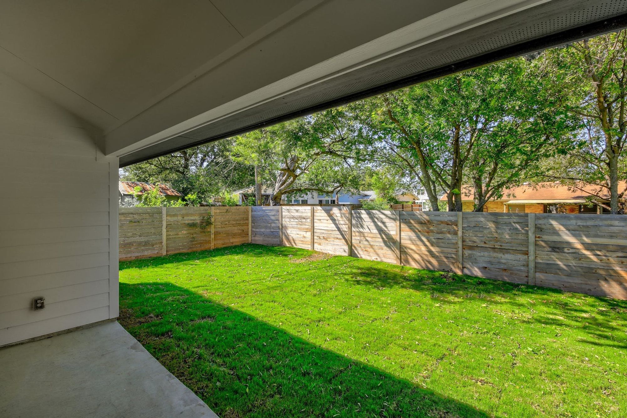 8302 Kromer Street Austin, TX 78757 - Photo 28 of 34 Fenced backyard featuring a patio area