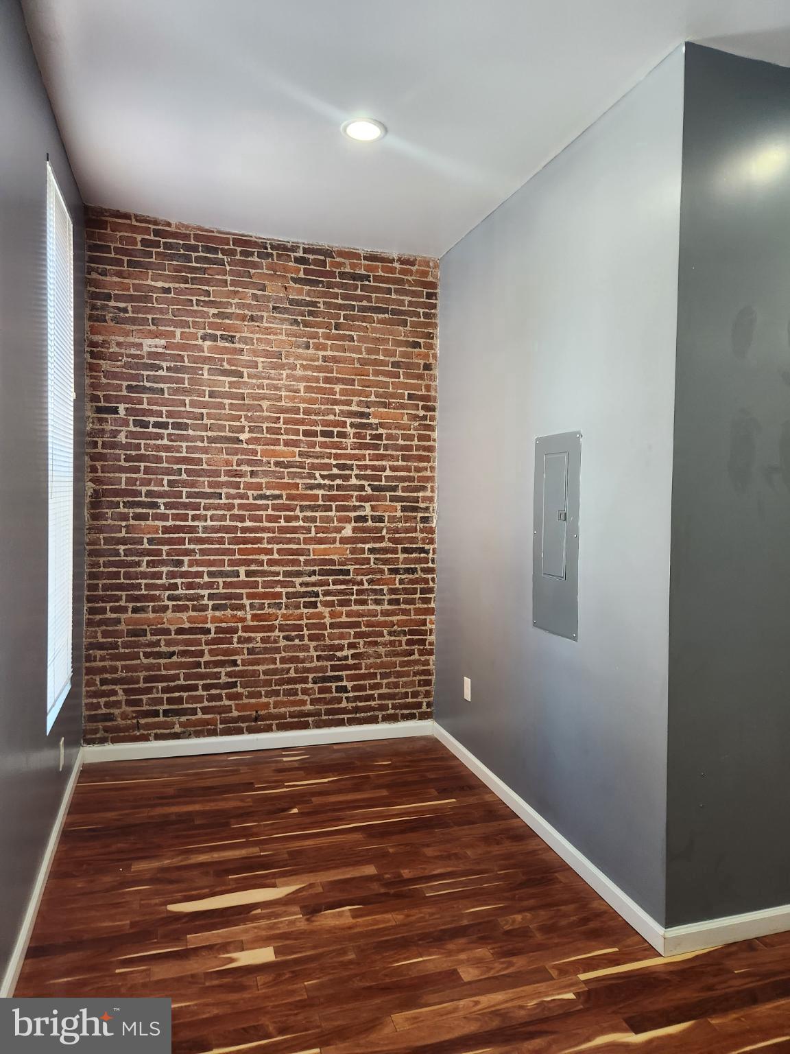 1421 West Baltimore Street, Unit 2 Baltimore, MD 21223 - Photo 4 of 24 1st BR with chic corner with exposed brick charm.