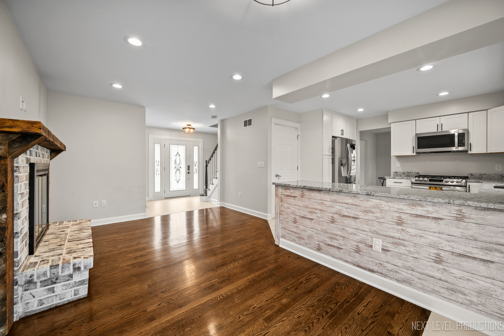 413 Cheever Avenue Geneva, IL 60134 - Photo 16 of 30 a large hall with white cabinets