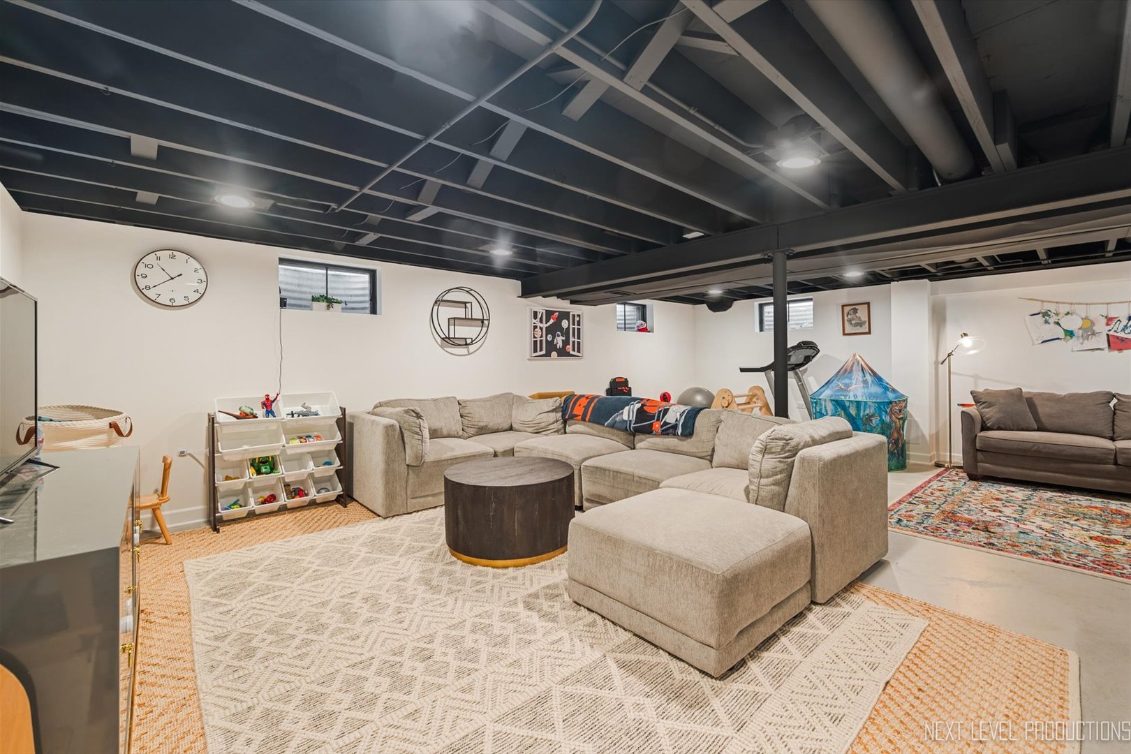 413 Cheever Avenue Geneva, IL 60134 - Photo 25 of 30 a living room with furniture and a chandelier