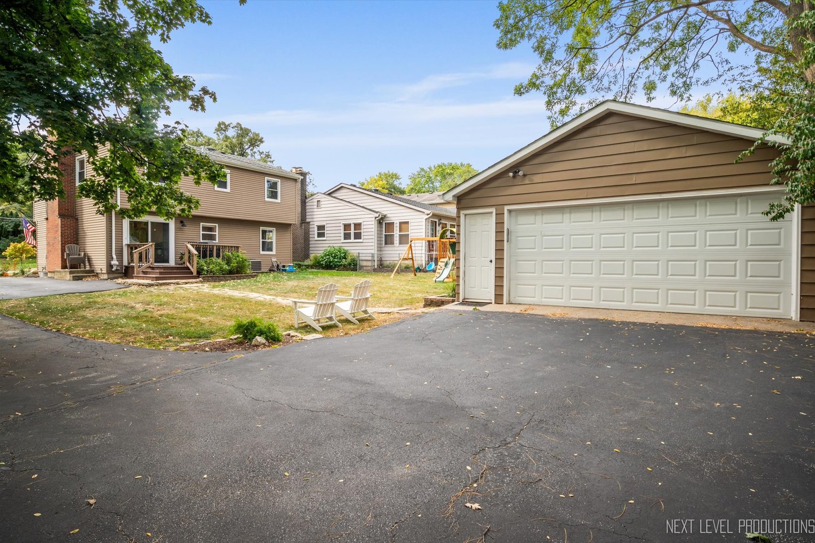 413 Cheever Avenue Geneva, IL 60134 - Photo 27 of 30 a view of a house with a yard and garage