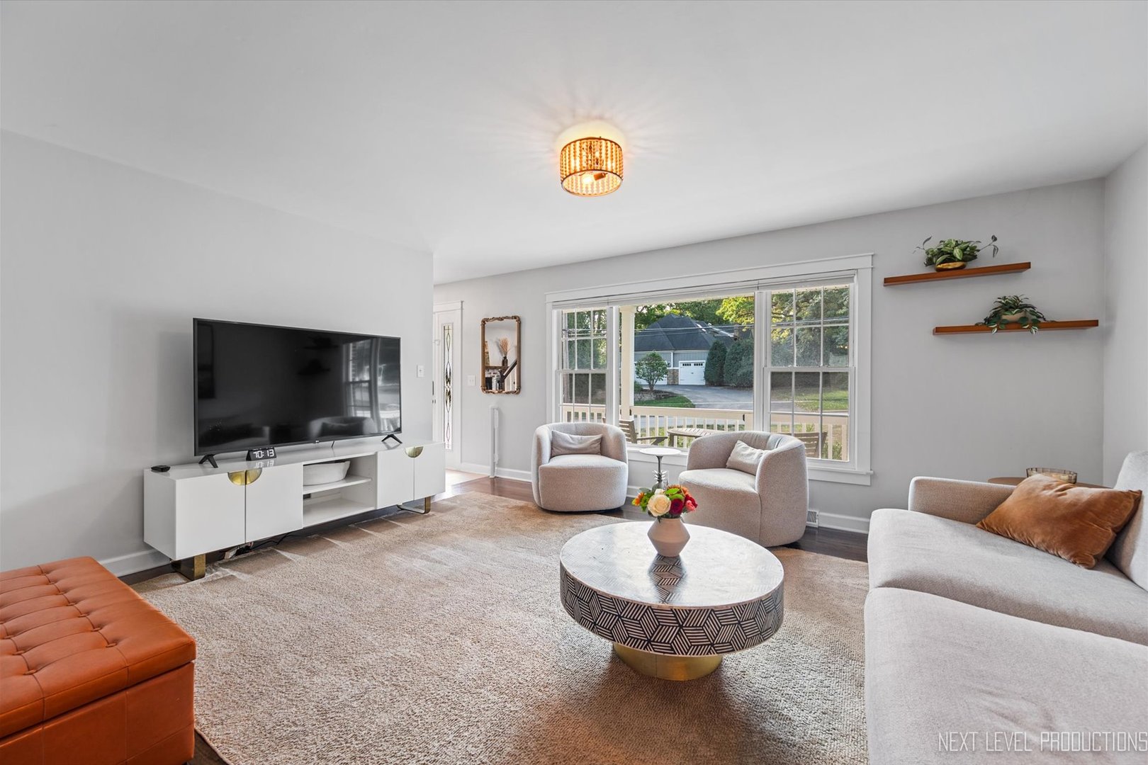 413 Cheever Avenue Geneva, IL 60134 - Photo 7 of 30 a living room with furniture and a flat screen tv