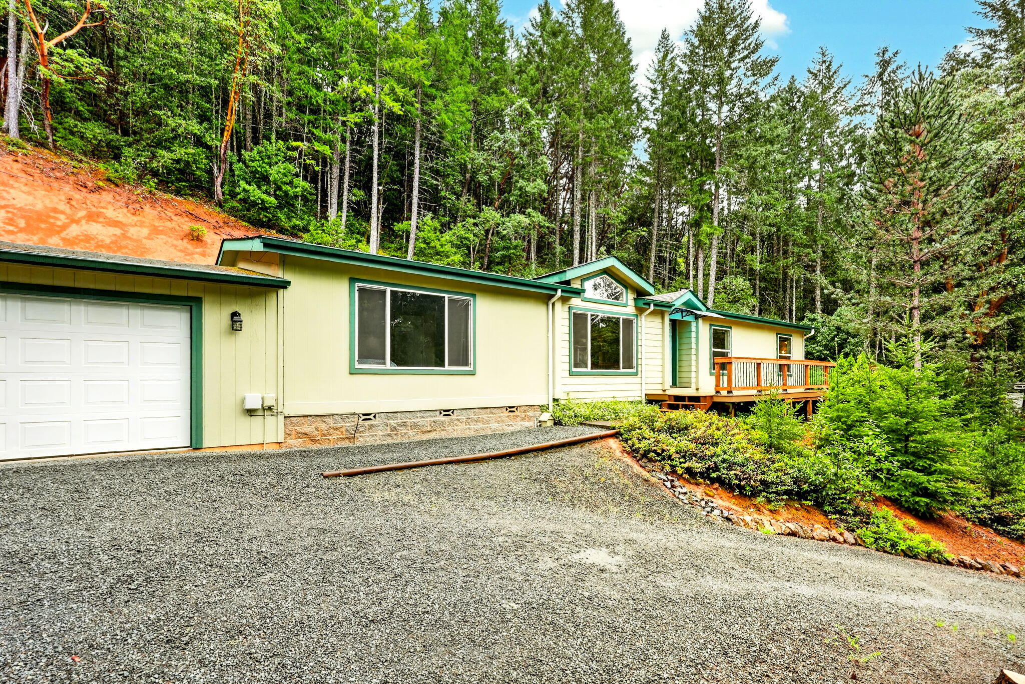 5445 Thompson Creek Road Selma, OR 97538 - Photo 1 of 57 a house view with a garden space