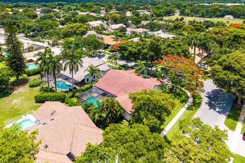 an aerial view of house with yard