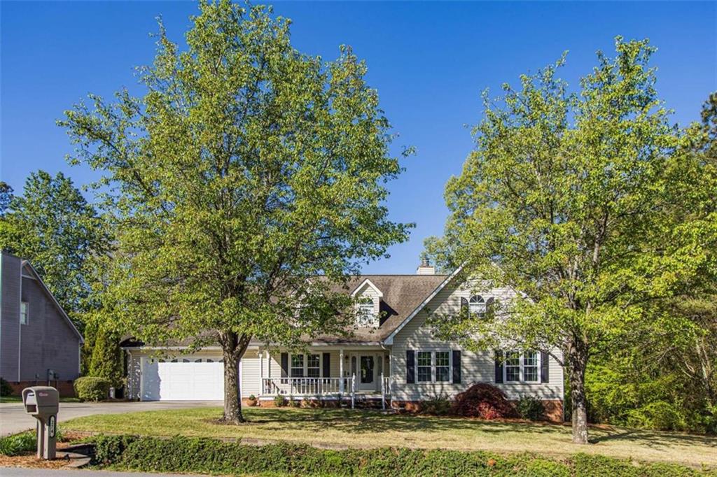 274 Eden Valley Road Southeast Rome, GA 30161 - Photo 1 of 1 a front view of a house with a garden
