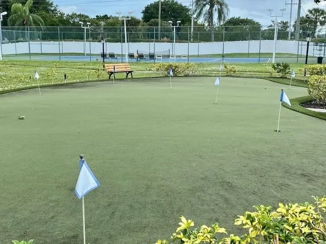 a view of a lake with a swimming pool