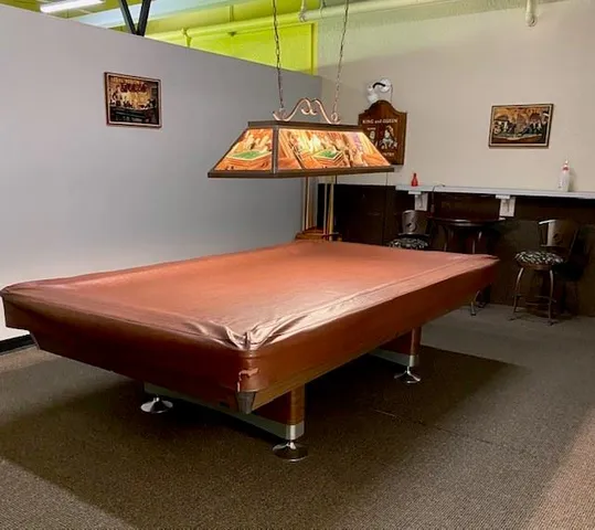 a room with table chairs and table