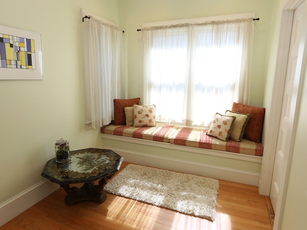 166 Chestnut Street Cambridge, MA 02139 - Photo 14 of 30 a living room with furniture and a window