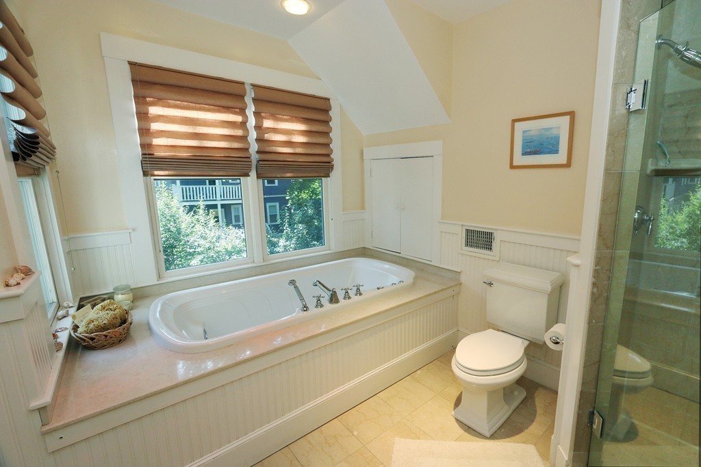166 Chestnut Street Cambridge, MA 02139 - Photo 15 of 30 a bathroom with a sink a toilet and a bathtub