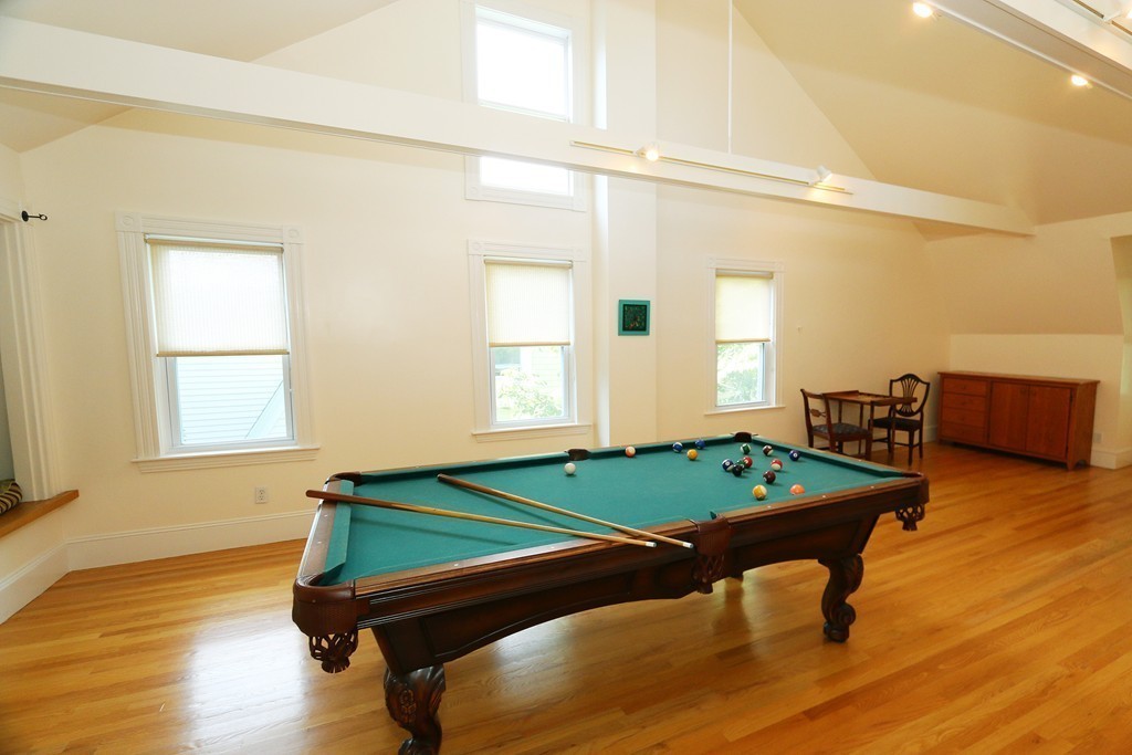 166 Chestnut Street Cambridge, MA 02139 - Photo 21 of 30 a room with furniture and windows