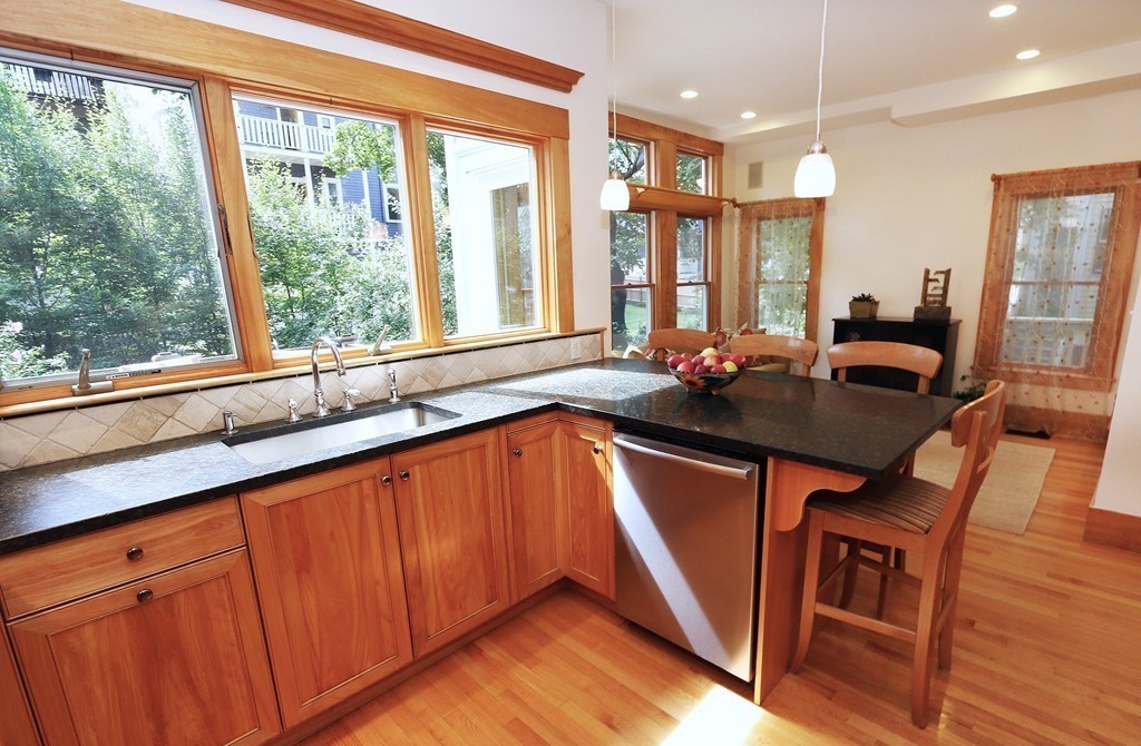 166 Chestnut Street Cambridge, MA 02139 - Photo 6 of 30 a dining table chair next to a window