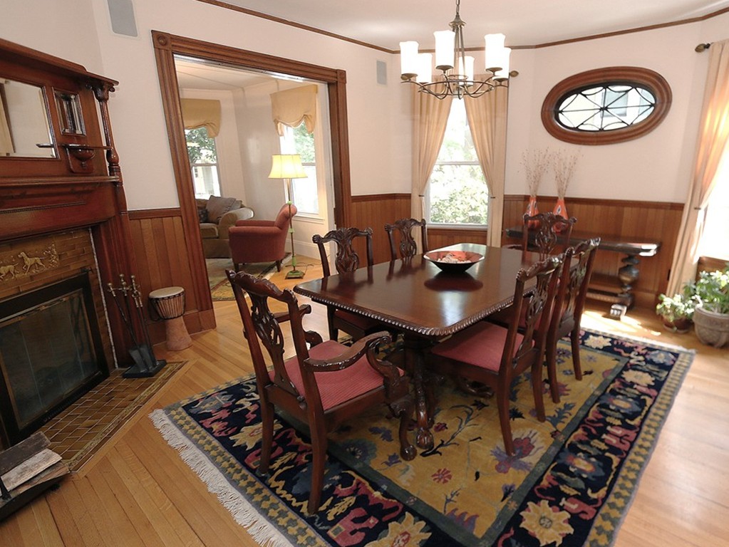 166 Chestnut Street Cambridge, MA 02139 - Photo 9 of 30 a view of a dining room with furniture window and wooden floor