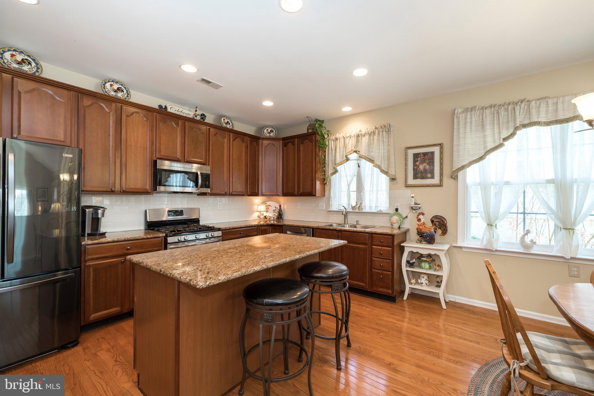 305 Gilmer Road Coatesville, PA 19320 - Photo 10 of 46 Bright and Open Kitchen w/ Granite Island