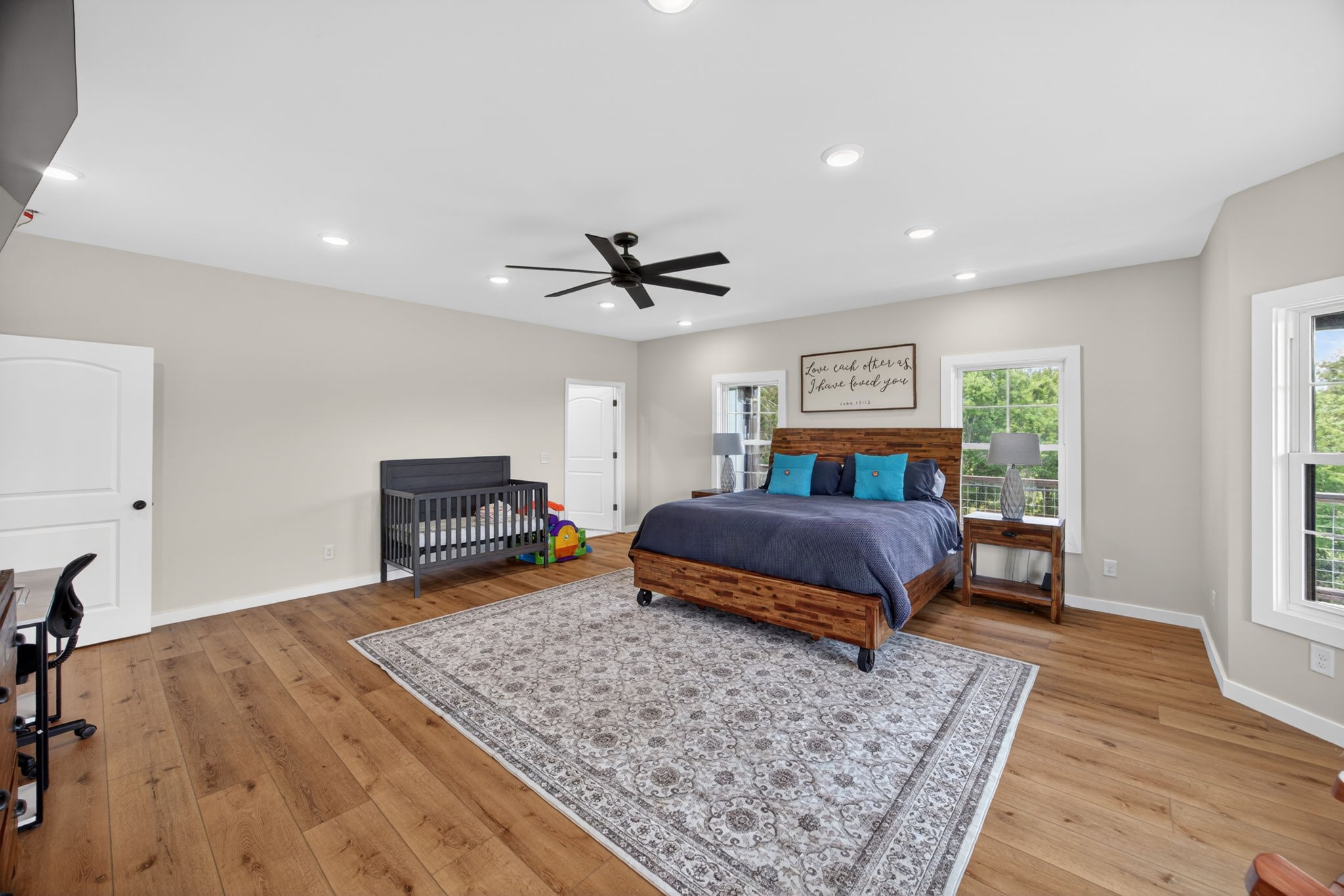 1288 Hills Trace Road Morrison, TN 37357 - Photo 23 of 57 a bedroom with a bed and a dresser with wooden floor