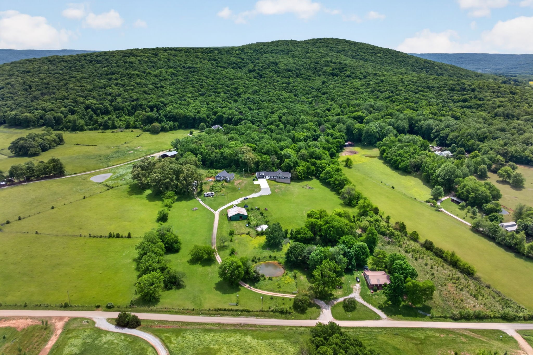 1288 Hills Trace Road Morrison, TN 37357 - Photo 53 of 57 an aerial view of a residential houses with yard and lake view