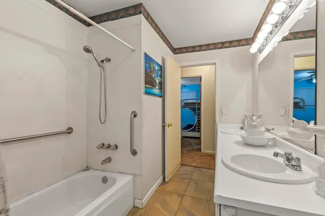 a bathroom with a sink and a bathtub