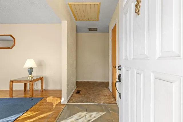 a view of entryway with wooden floor