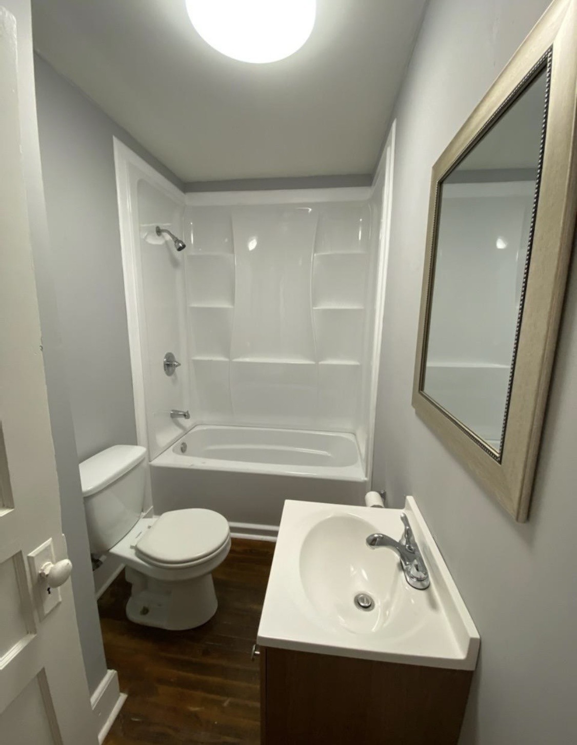 424 Jones Street Pulaski, TN 38478 - Photo 8 of 8 a bathroom with a sink and a mirror