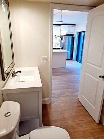 3900 County Line Road, Unit 16A Tequesta, FL 33469 - Photo 14 of 27 a bathroom with a sink toilet and shower