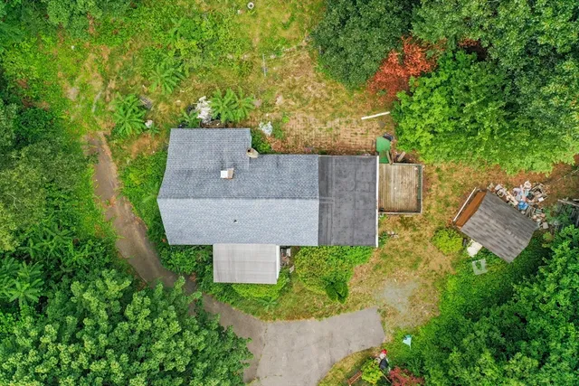 a aerial view of a house with garden