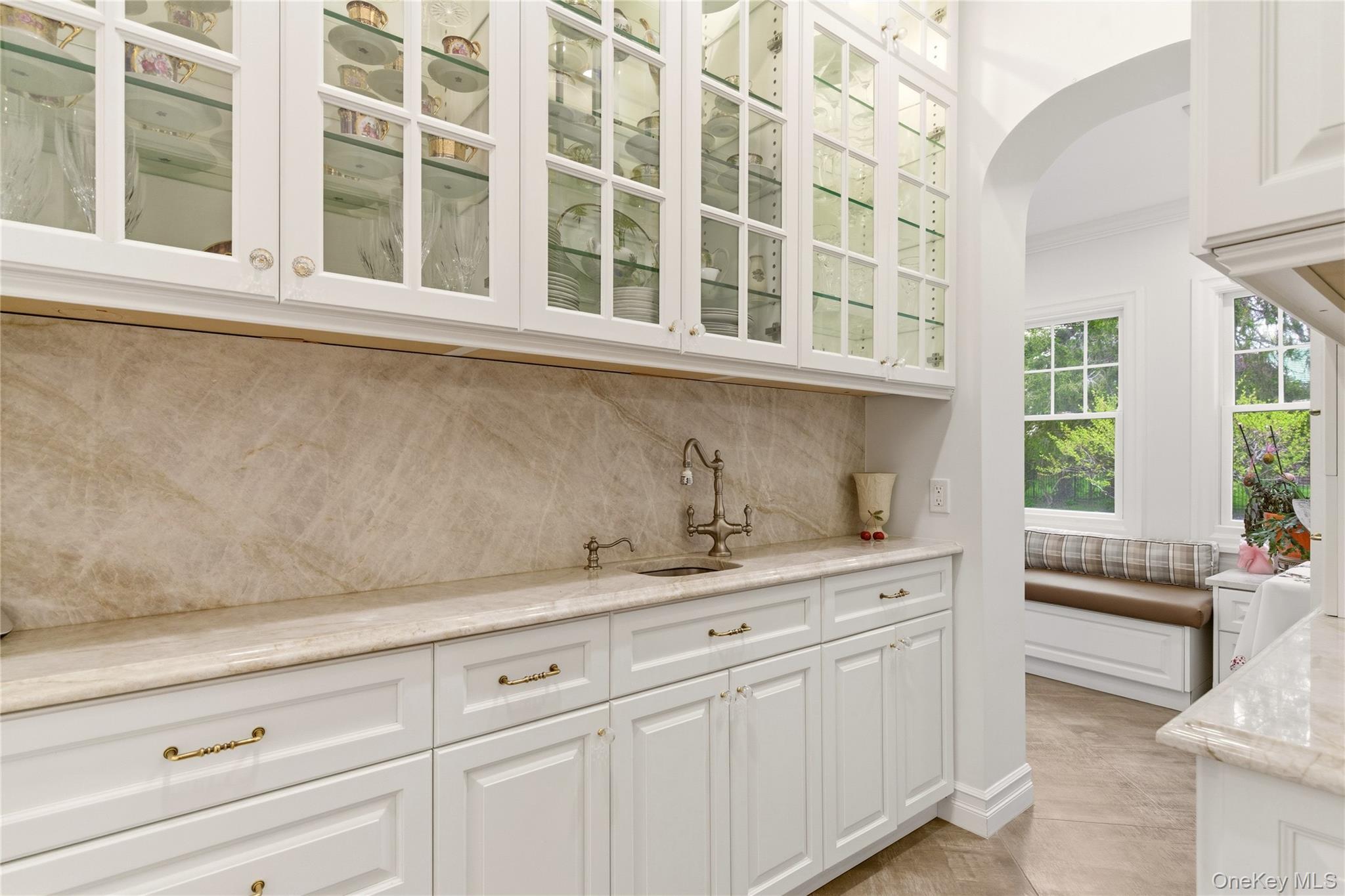 89 Duck Pond Road Glen Cove, NY 11542 - Photo 11 of 37 a kitchen with a sink and cabinets