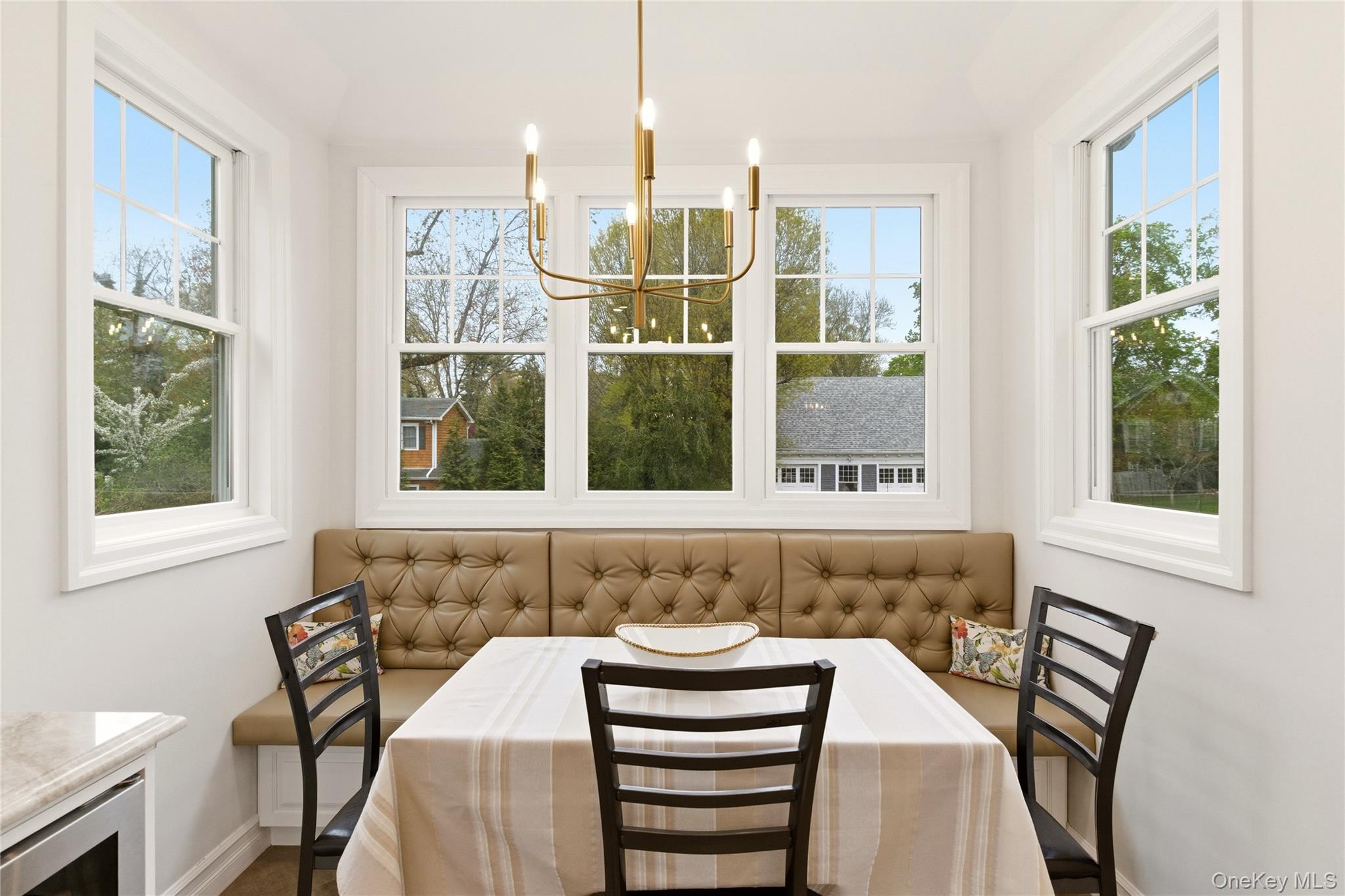 89 Duck Pond Road Glen Cove, NY 11542 - Photo 16 of 37 a view of a dining room with furniture and window