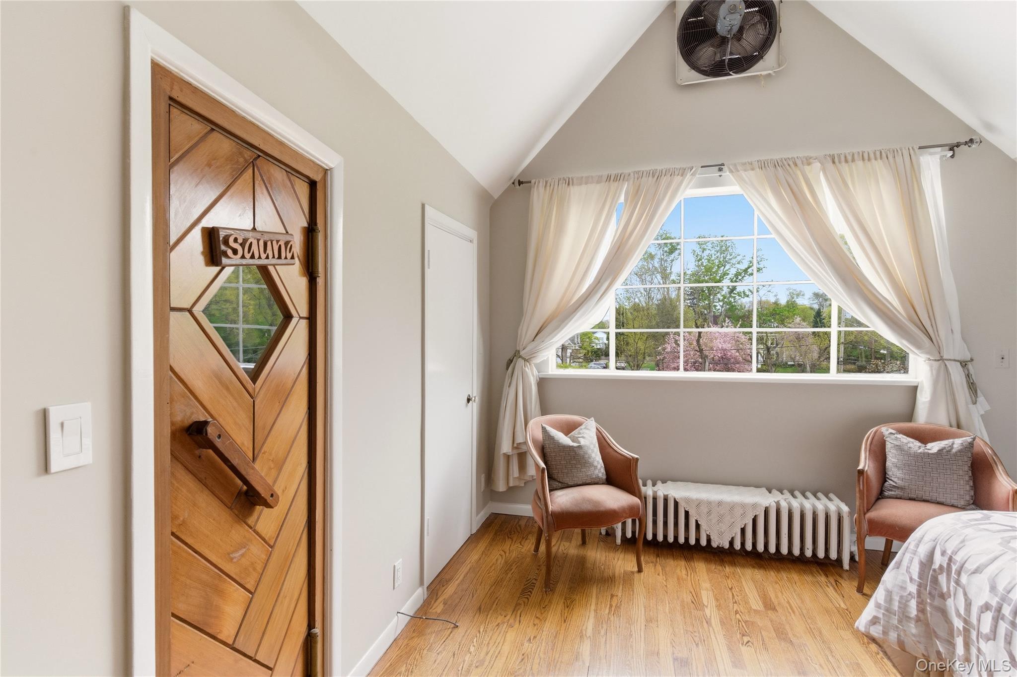 89 Duck Pond Road Glen Cove, NY 11542 - Photo 30 of 37 a living room with furniture and a window