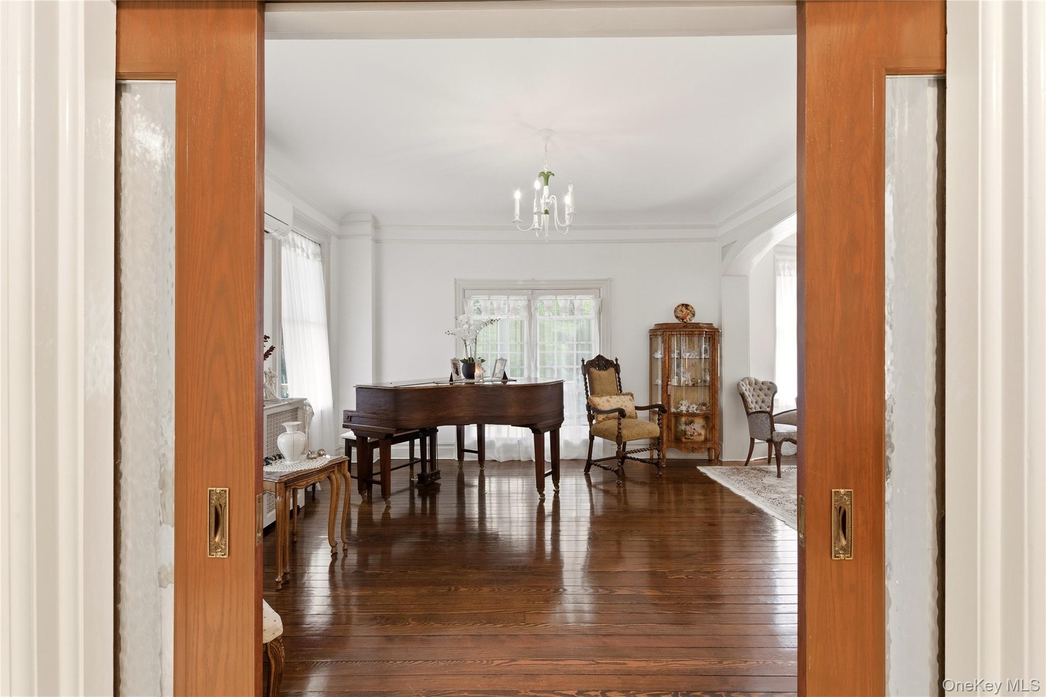 89 Duck Pond Road Glen Cove, NY 11542 - Photo 5 of 37 a view of dining room with furniture and wooden floor