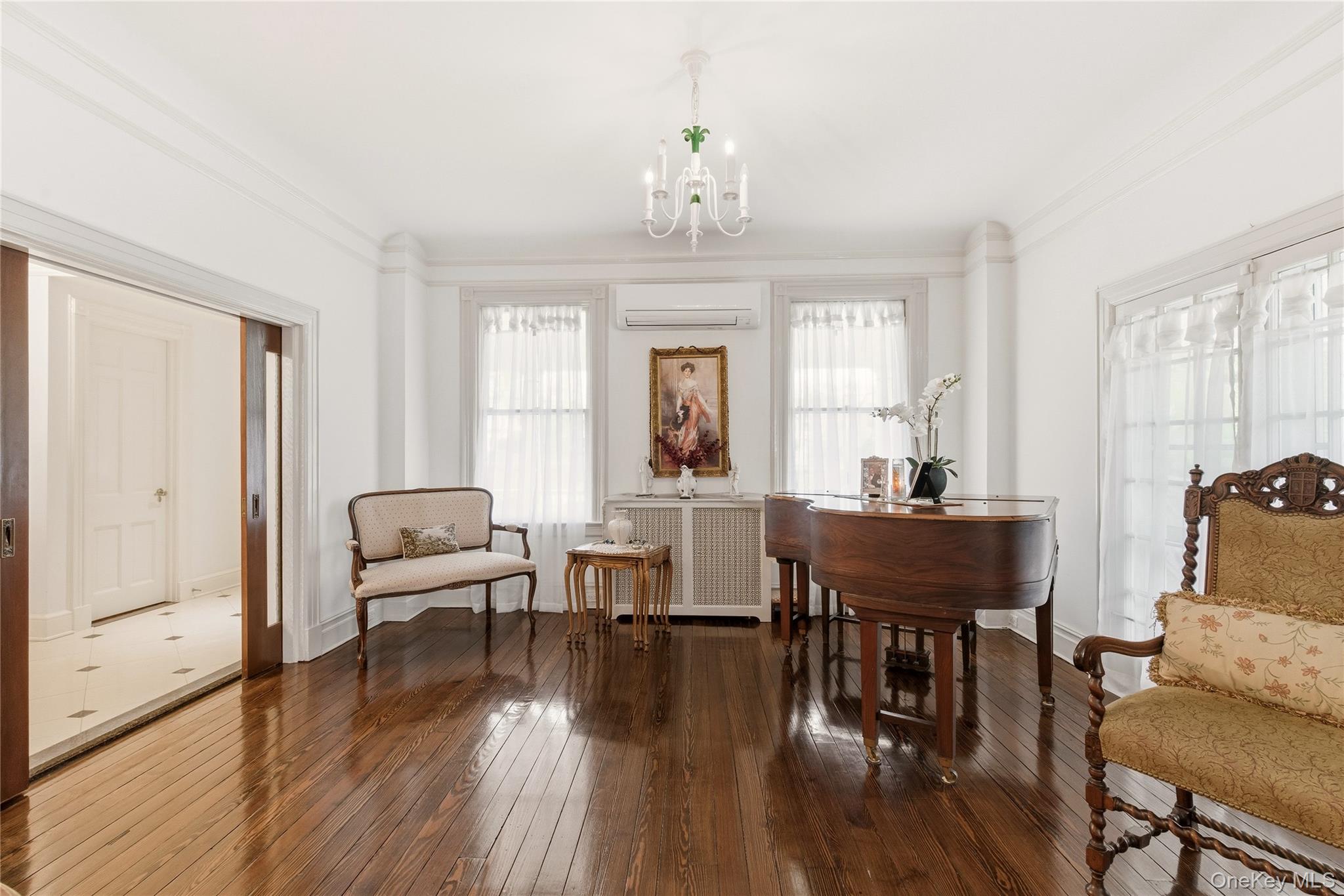 89 Duck Pond Road Glen Cove, NY 11542 - Photo 6 of 37 a view of a livingroom with furniture window and wooden floor