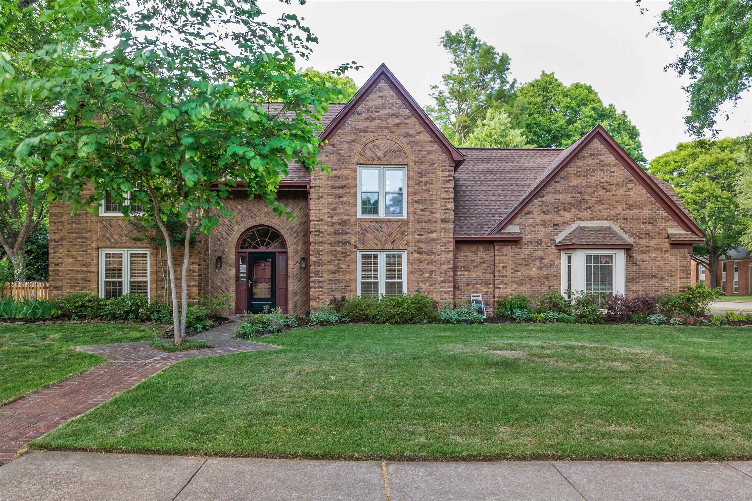 Spring Time is when this house shines and blooms and you can see it all from your Covered Patio or numerous double pane windows across the back of the house! Wonderfully maintained home! Roof 2022! All 3 toilets 2019! Walk-In Shower 2023! And MORE!