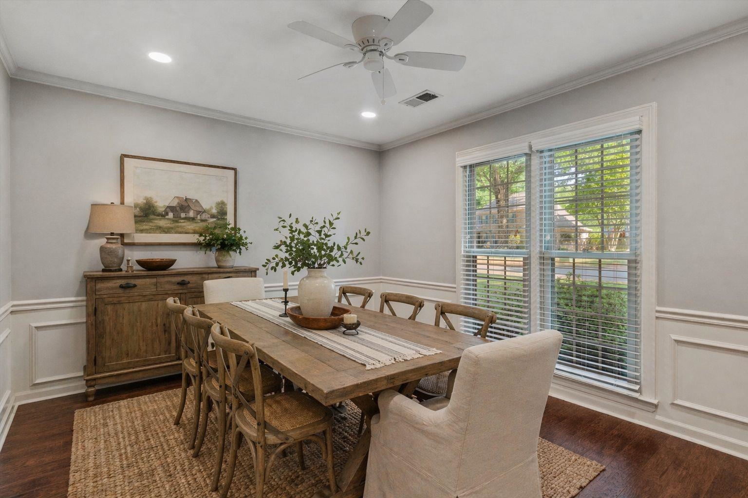 10288 Waterford Road Collierville, TN 38017 - Photo 3 of 35 A refined space with LVP, crown molding, and elegant chair and shadowbox molding—perfect for gatherings. Virtually Staged Photo