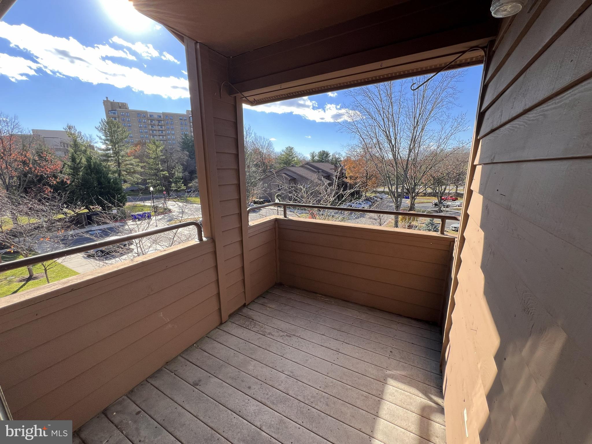 5355 Smooth Meadow Way, Unit 5 Columbia, MD 21044 - Photo 22 of 27 a view of balcony with furniture