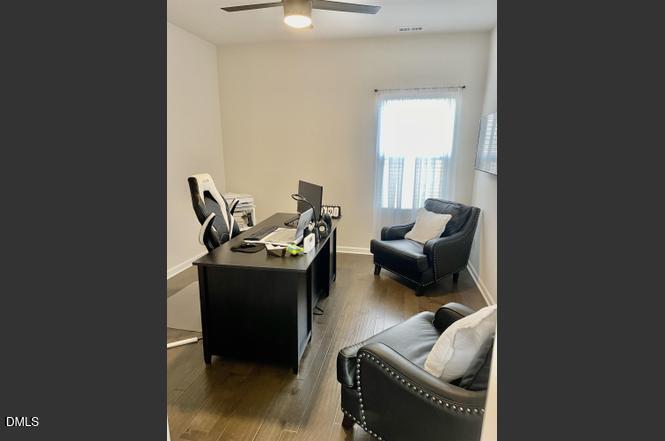 1807 Wrenn Road Durham, NC 27703 - Photo 24 of 43 a living room with furniture and a large window