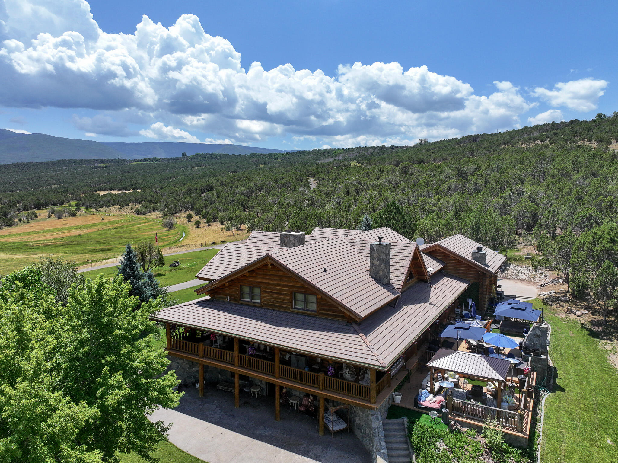 56106 Me Road Collbran, CO 81624 - Photo 5 of 27 deacon-gulch-ranch-back-deck
