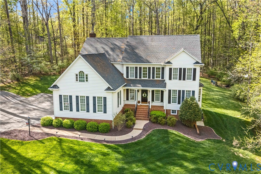 638 Cross Ridge Lane Manakin-Sabot, VA 23103 - Photo 49 of 54 a front view of a house with a yard
