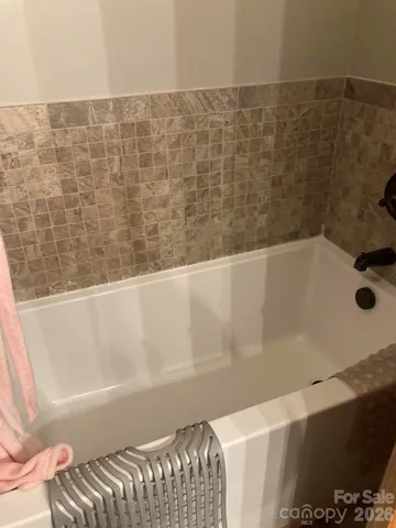 a bathroom with a bathtub
