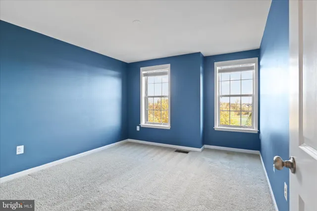a bathroom with a double vanity sink mirror and double