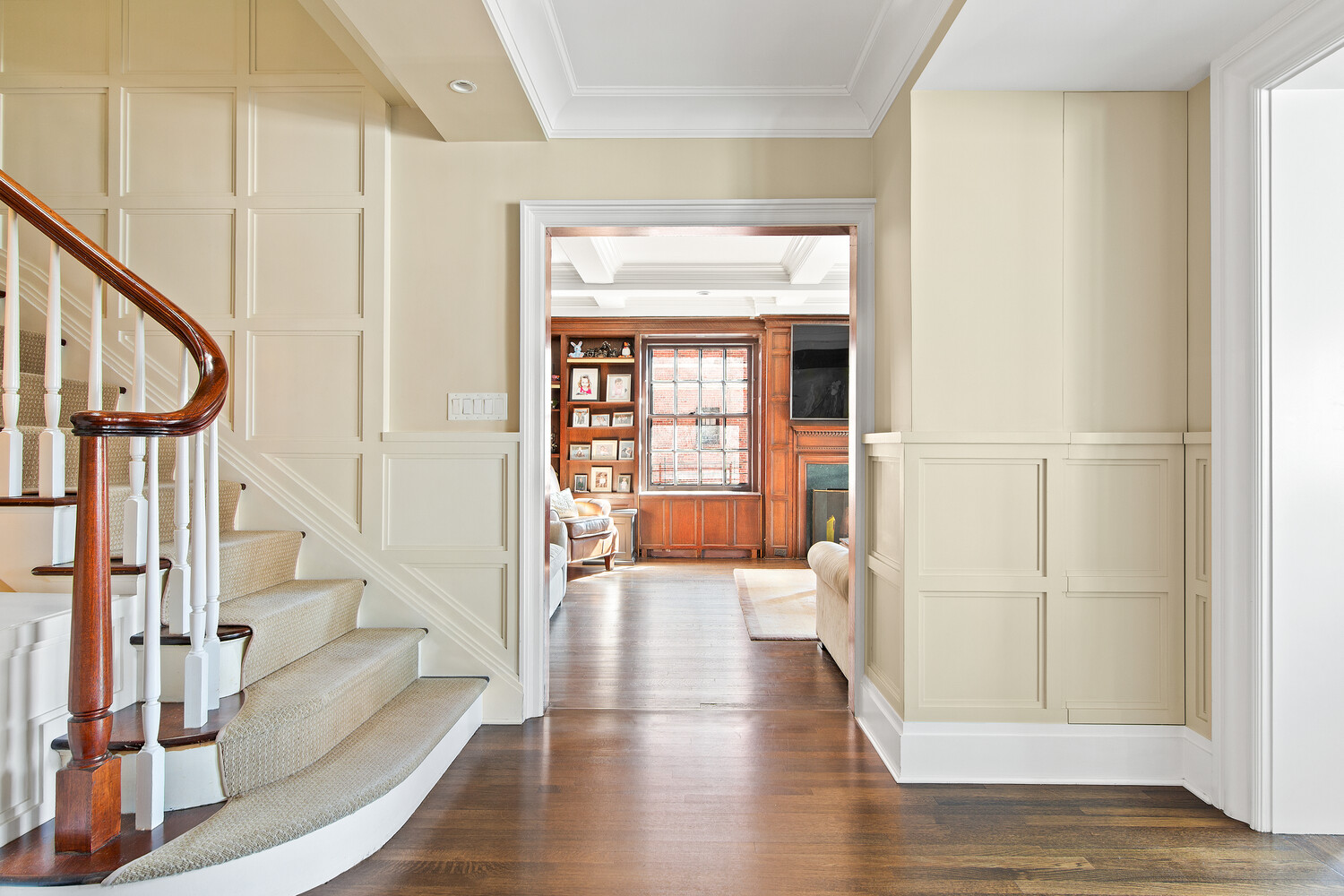 333 East 68th Street, Unit PHC Manhattan, NY 10065 - Photo 7 of 24 a view of an entryway with wooden floor and door