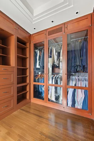 a bathroom with a sink a toilet and window