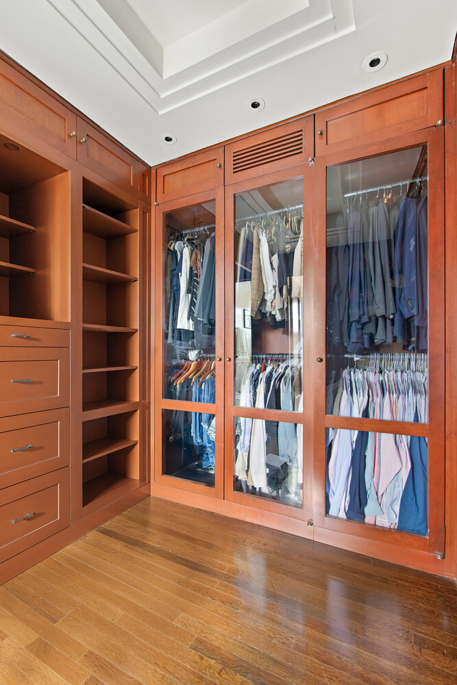333 East 68th Street, Unit PHC Manhattan, NY 10065 - Photo 9 of 24 a view of a room with shelves