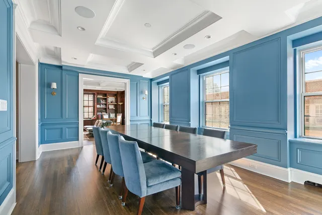 a living room with furniture fireplace and flat screen tv