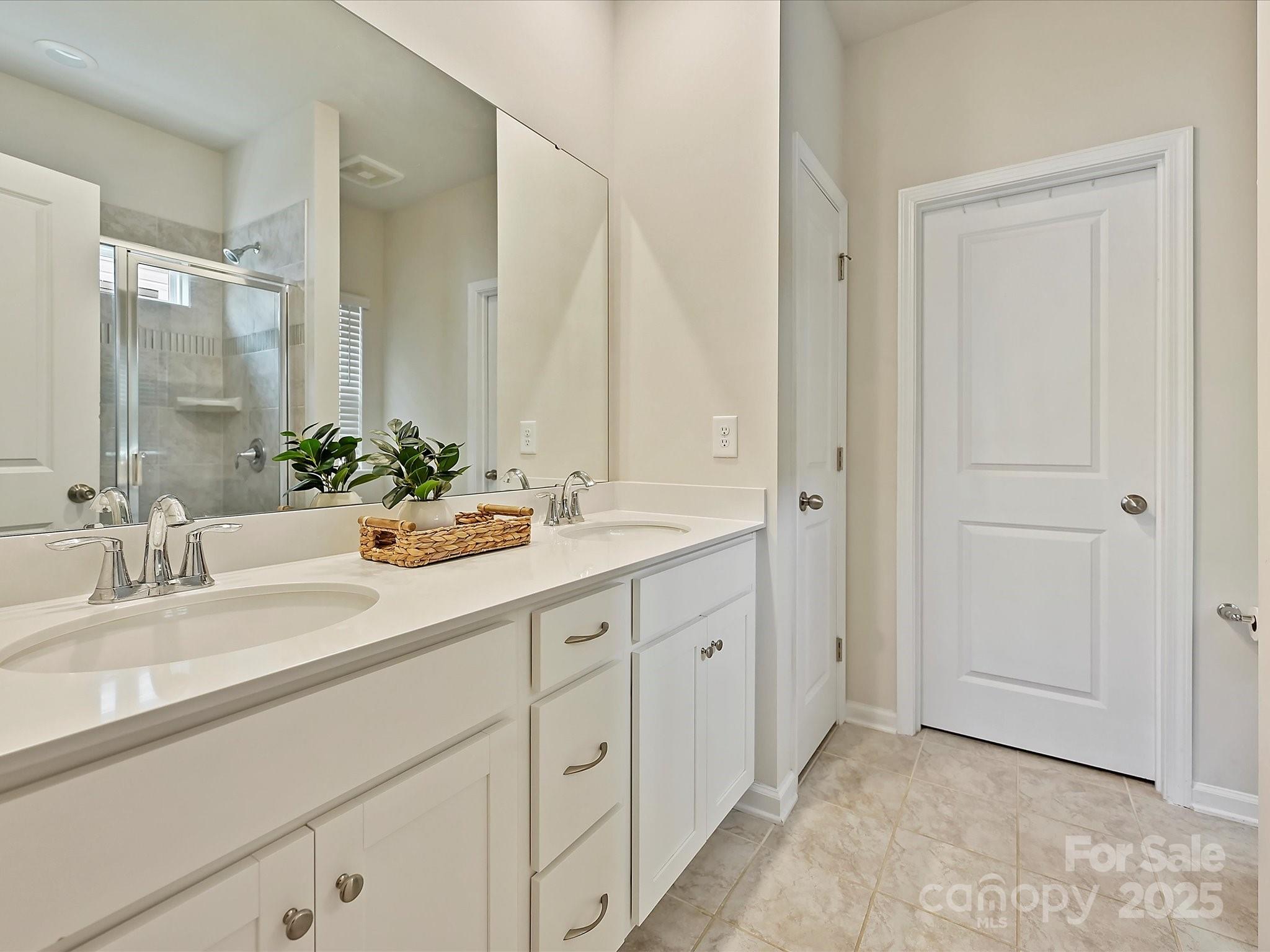 5807 Soft Shell Drive Lancaster, SC 29720 - Photo 13 of 33 a bathroom with a sink and a mirror