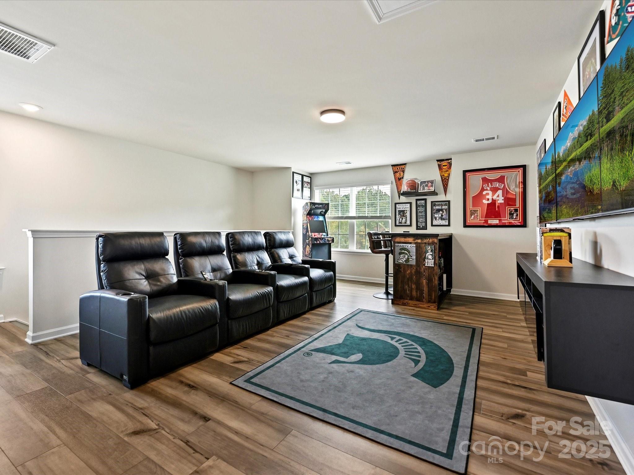 5807 Soft Shell Drive Lancaster, SC 29720 - Photo 16 of 33 a living room with furniture and a flat screen tv