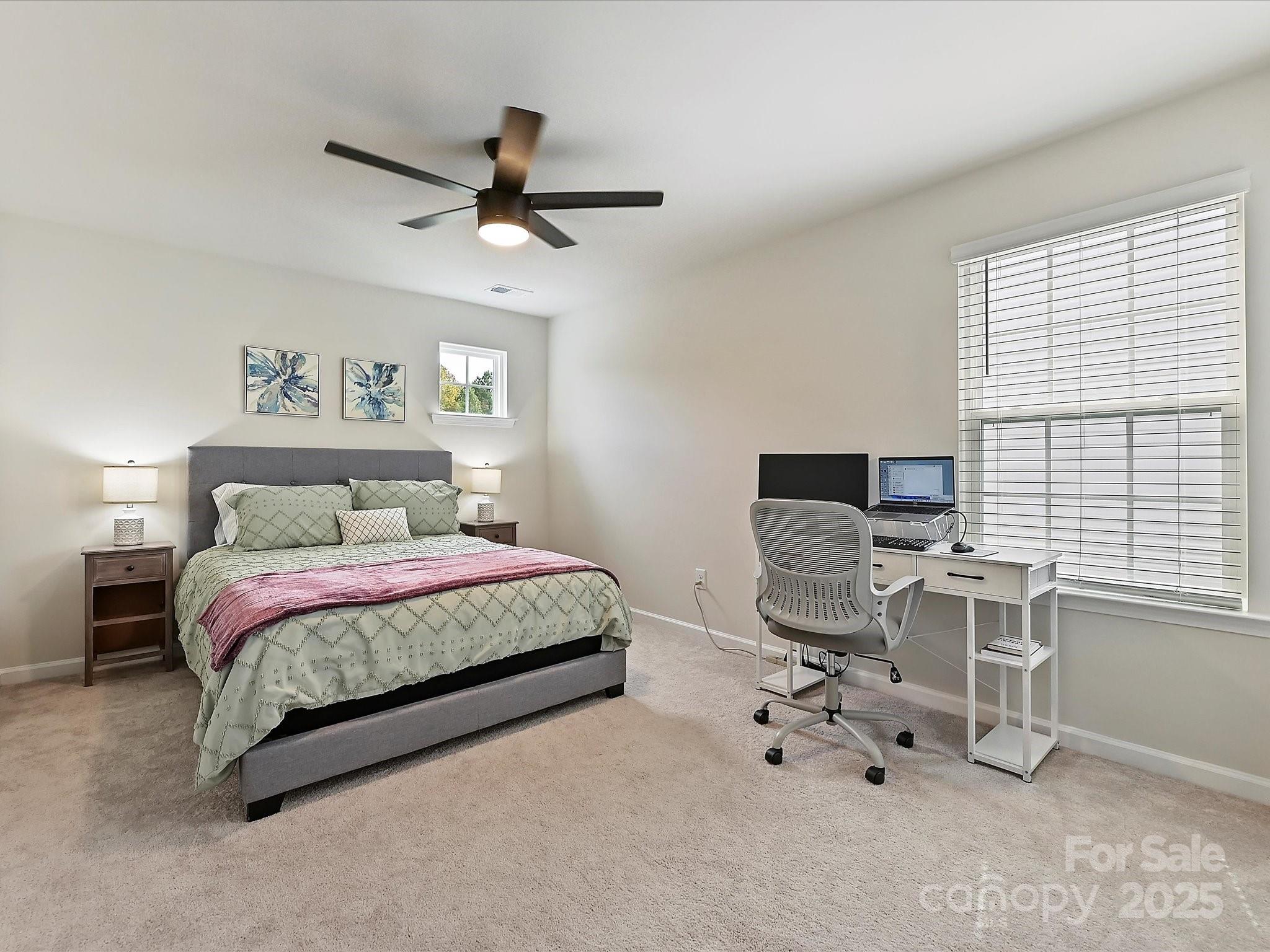 5807 Soft Shell Drive Lancaster, SC 29720 - Photo 18 of 33 a spacious bedroom with a bed and a desk