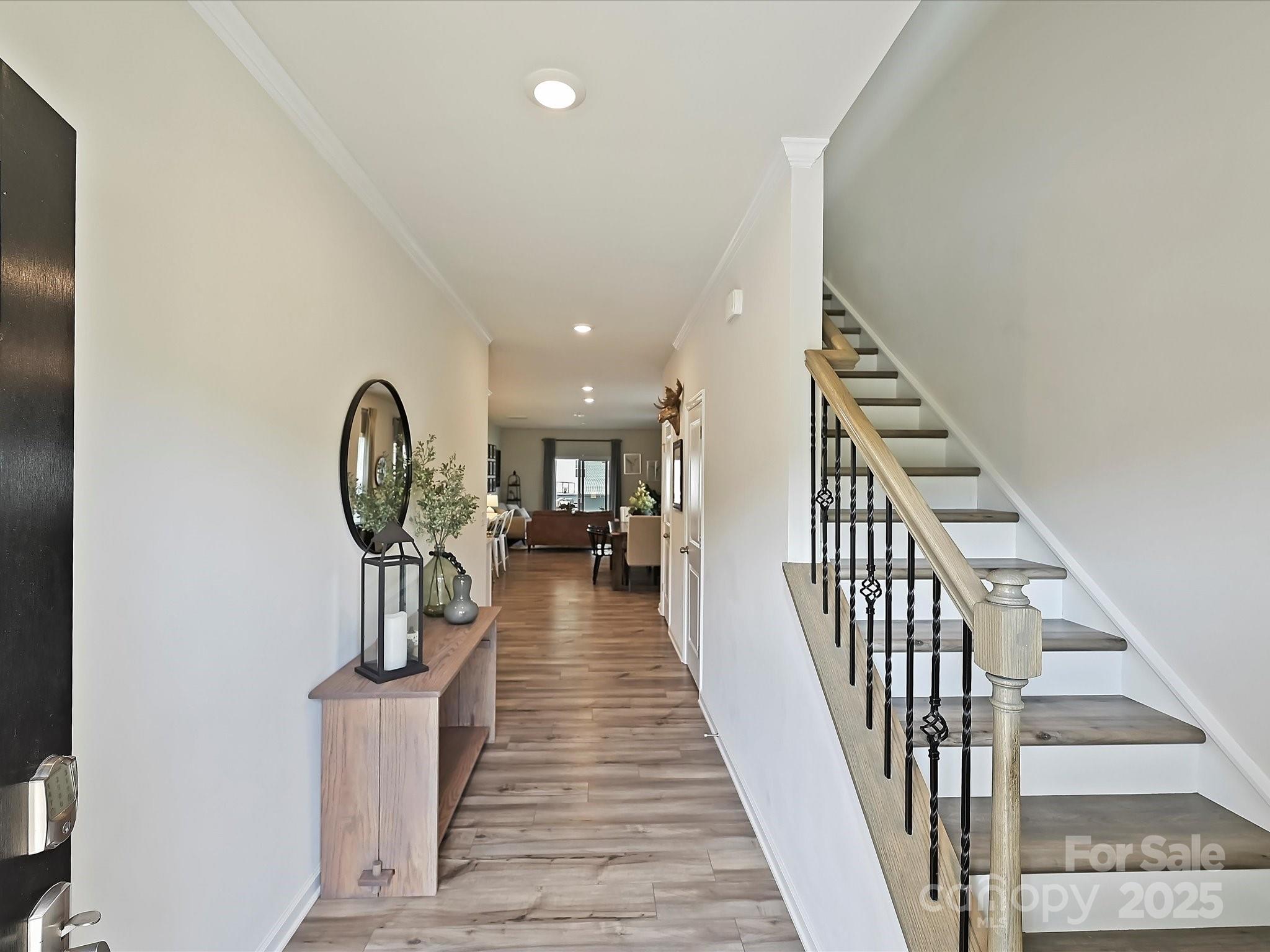 5807 Soft Shell Drive Lancaster, SC 29720 - Photo 2 of 33 a view of entryway and hall with wooden floor