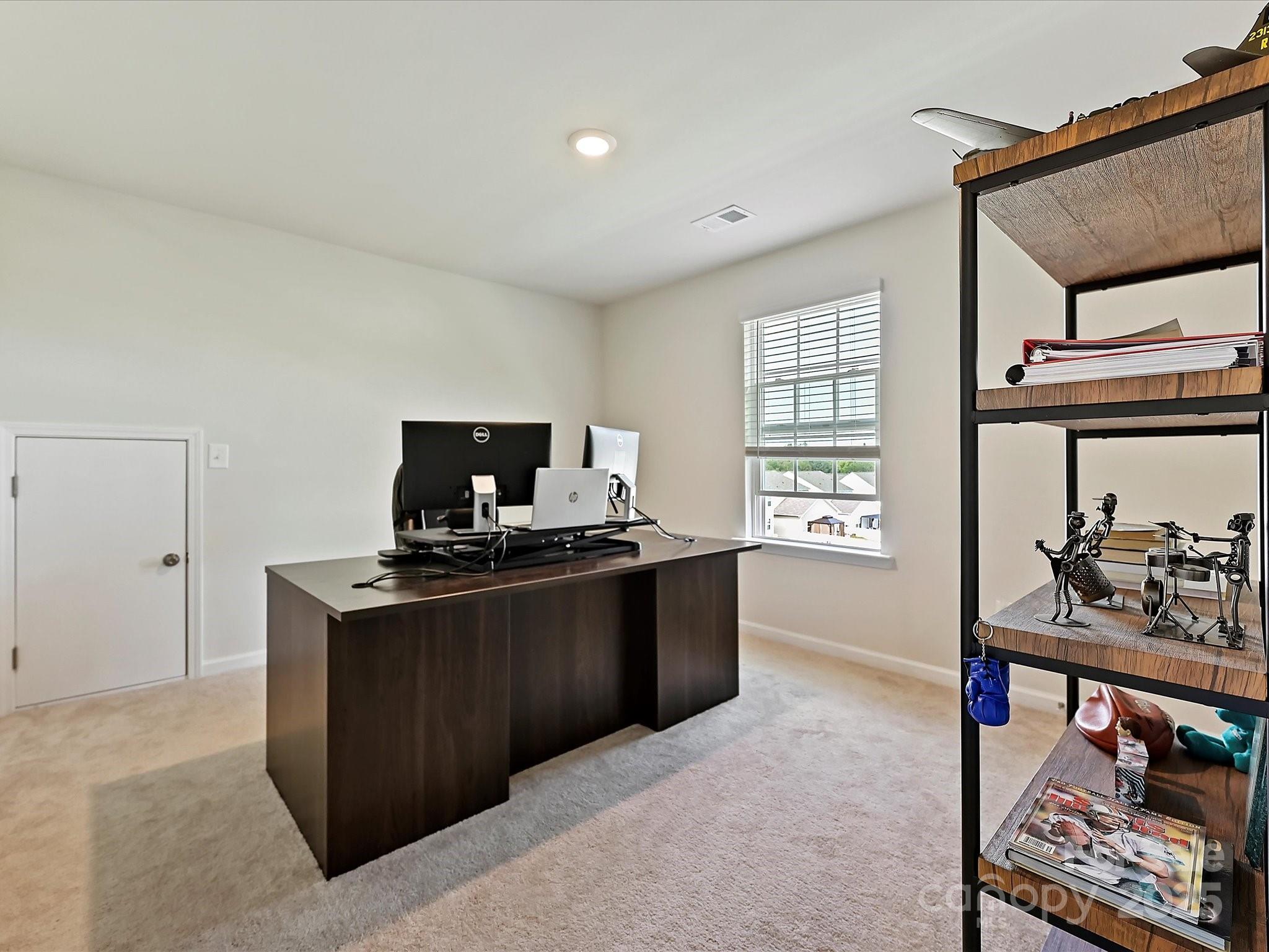 5807 Soft Shell Drive Lancaster, SC 29720 - Photo 21 of 33 a kitchen with stainless steel appliances granite countertop a stove and a sink