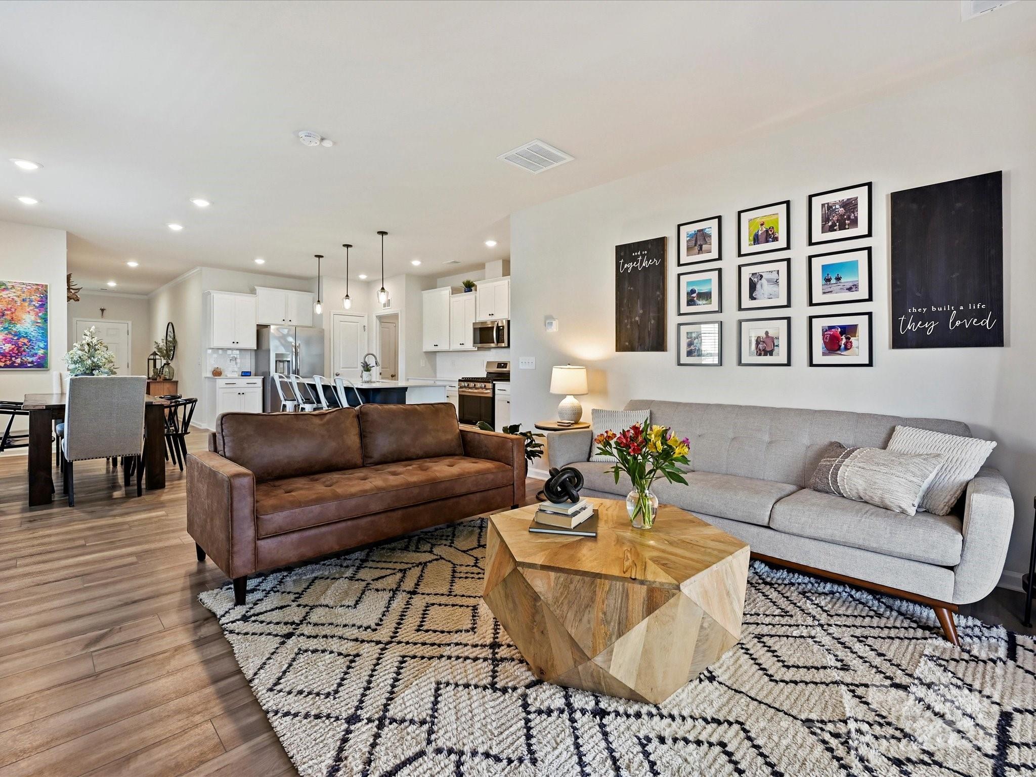 5807 Soft Shell Drive Lancaster, SC 29720 - Photo 8 of 33 a living room with furniture and wooden floor