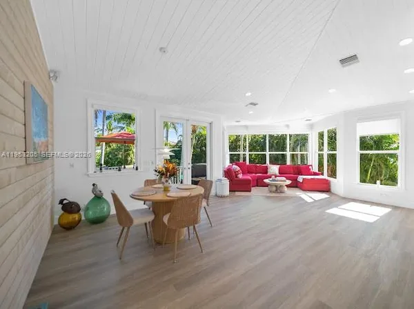 a room with furniture and a window